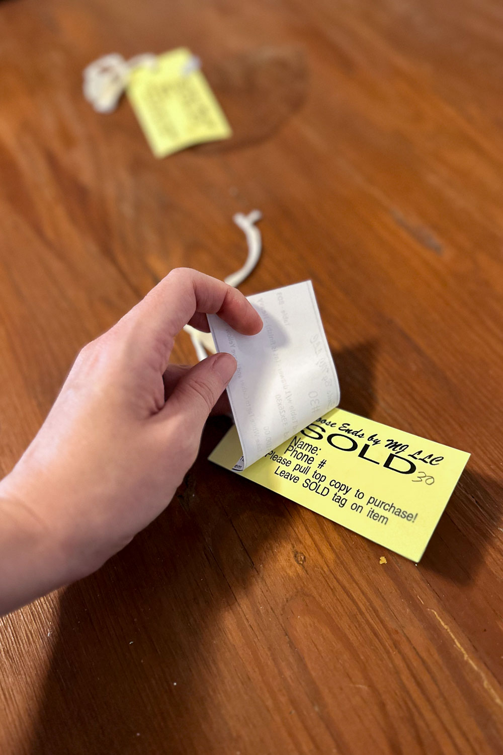 an example of a sold ticket on a large item at an estate sale