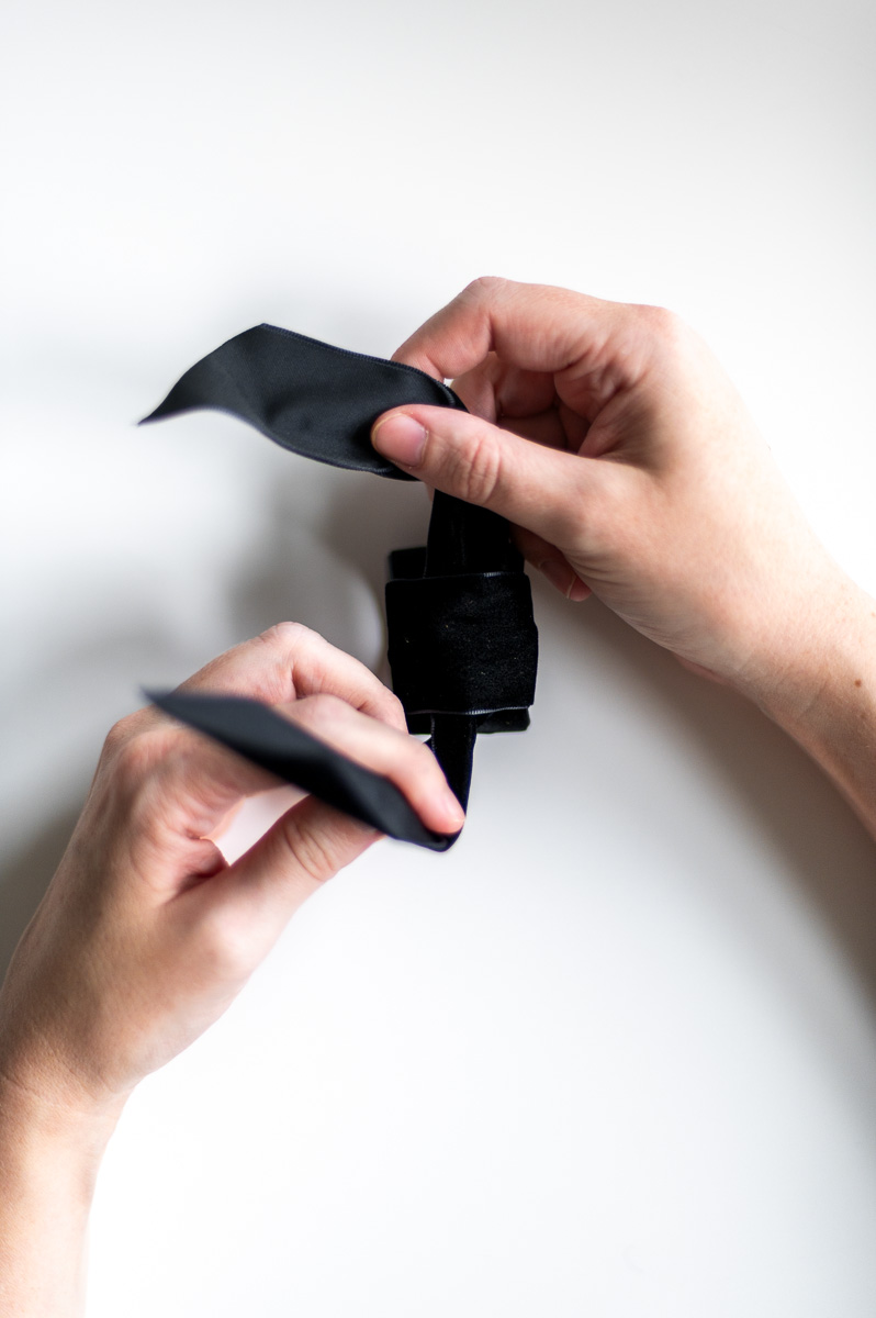 Step-by-step tutorial showing how to make black velvet DIY Napkin Rings for holiday entertaining.