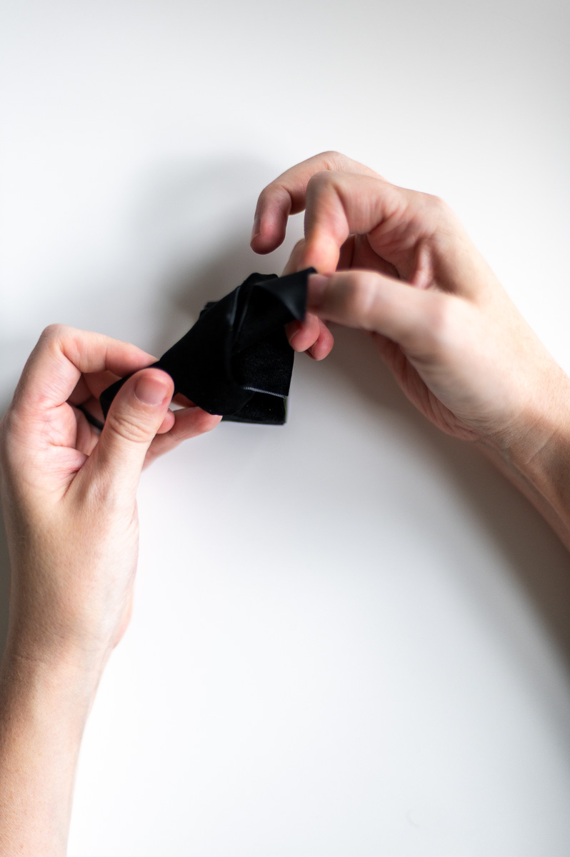 Step-by-step tutorial showing how to make black velvet DIY Napkin Rings for holiday entertaining.