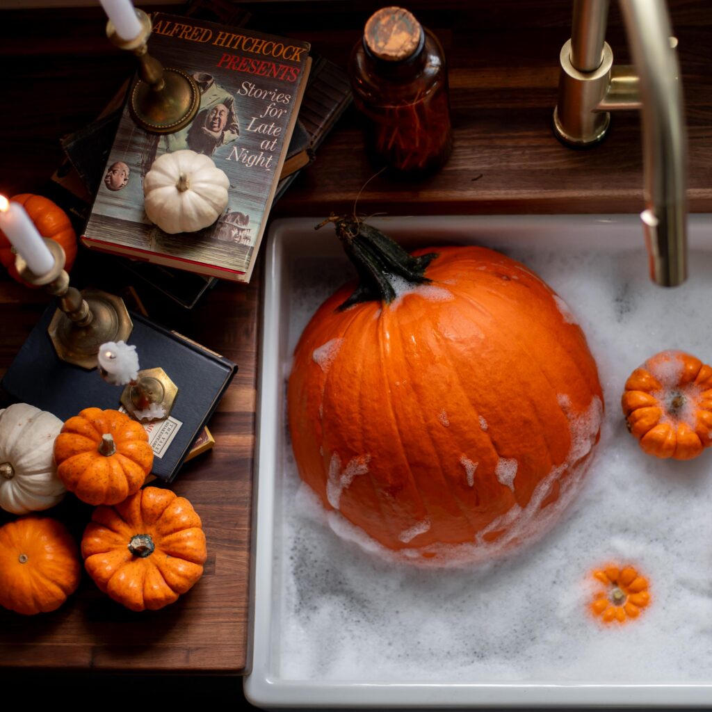 image showing how to use soap and water to clean a fall pumpkin so it last longer