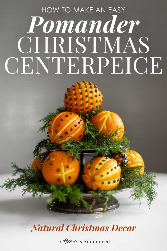 A side view of an orange pomander centerpiece with a text overlay that reads "How to make an easy pomander Christmas centerpiece: natural Christmas decor"