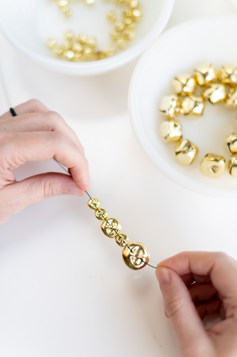 DIY holiday garland tutorial using gold jingle bells for old world Christmas decor