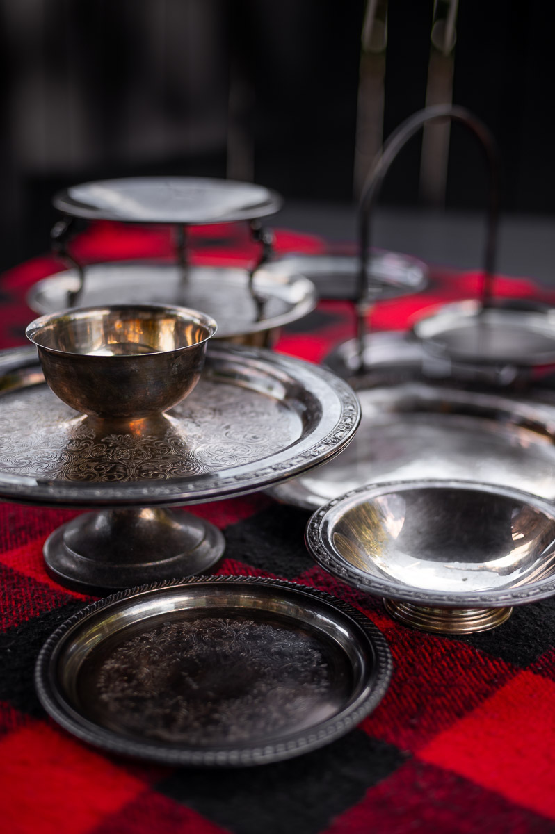 Tiered silver trays and raised cake stands for grazing table – adding height and variety to s’mores charcuterie board display.