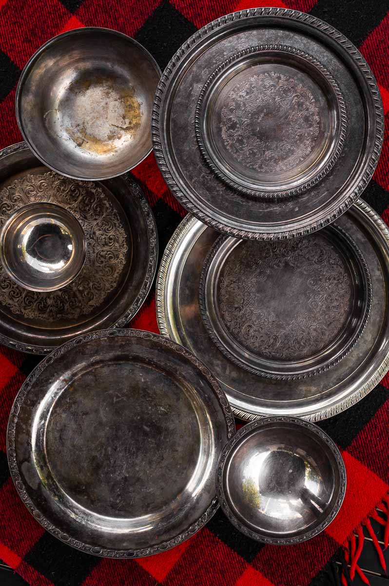 Overhead view of mismatched vintage silver platters – layering different shapes and sizes for s’mores grazing table styling.