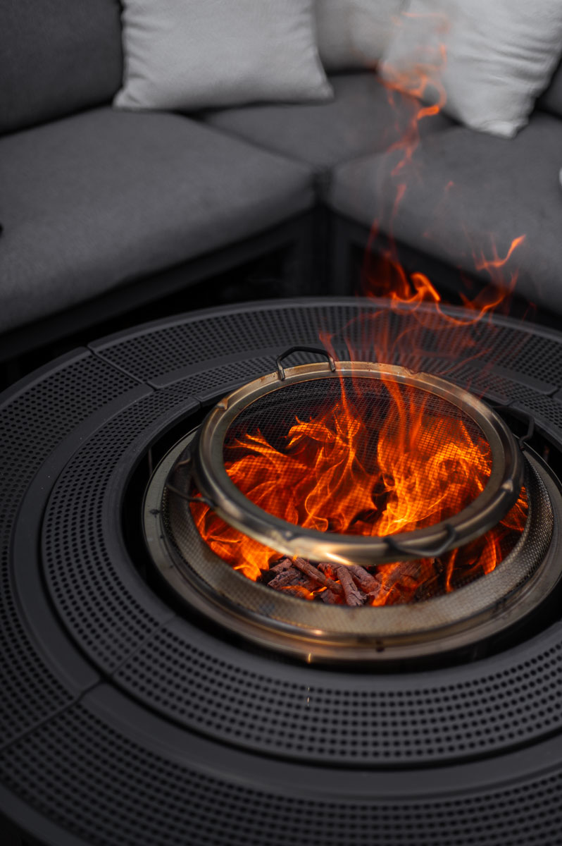 Solo Stove fire pit safely used on a composite deck during a bonfire party