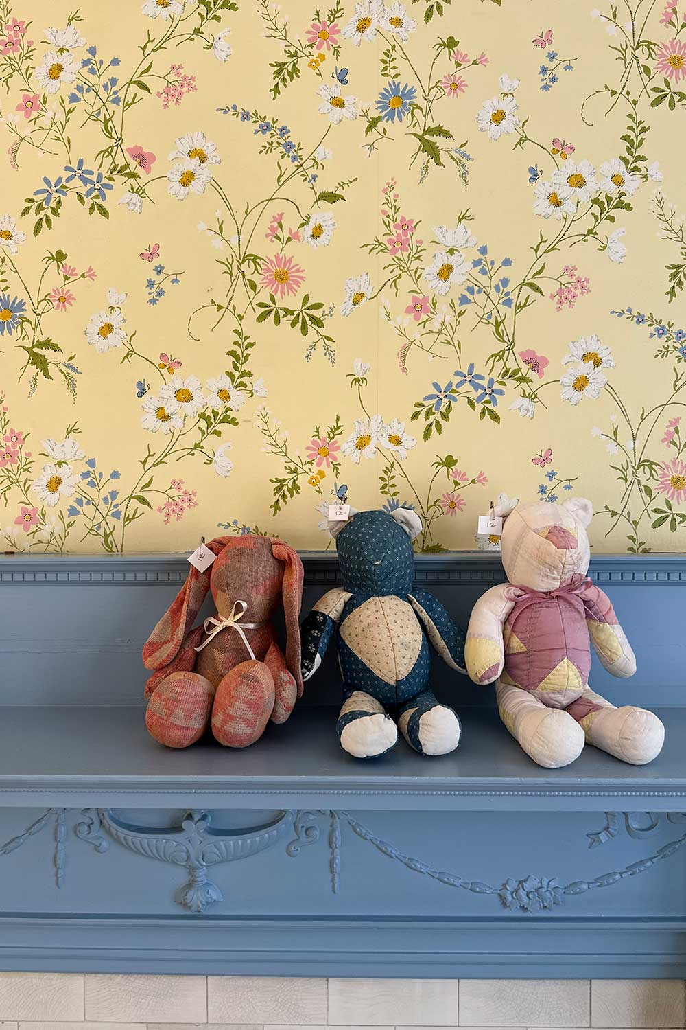 vintage quilted childrens toys seen at an estate sale shopping for home decor