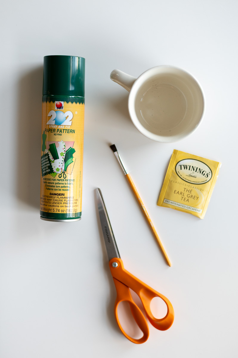 a collection of supplies needed to create DIY alphabet wall art decor for a nursery or playroom