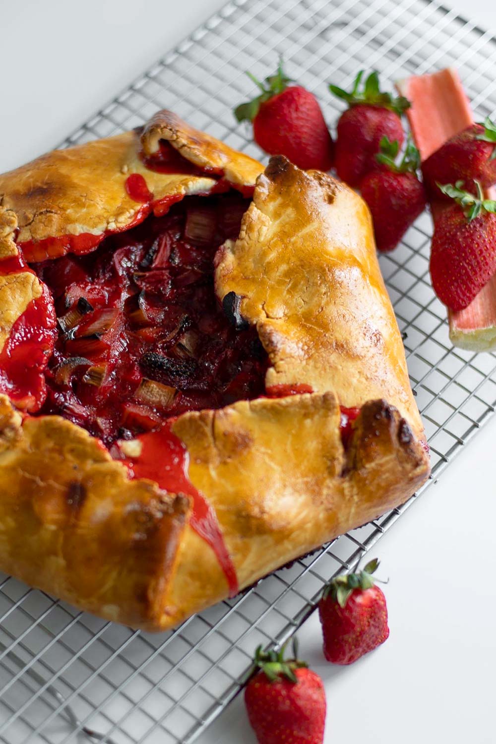 a strawberry rhubarb pie baked to share at a monthly dinner club for friends