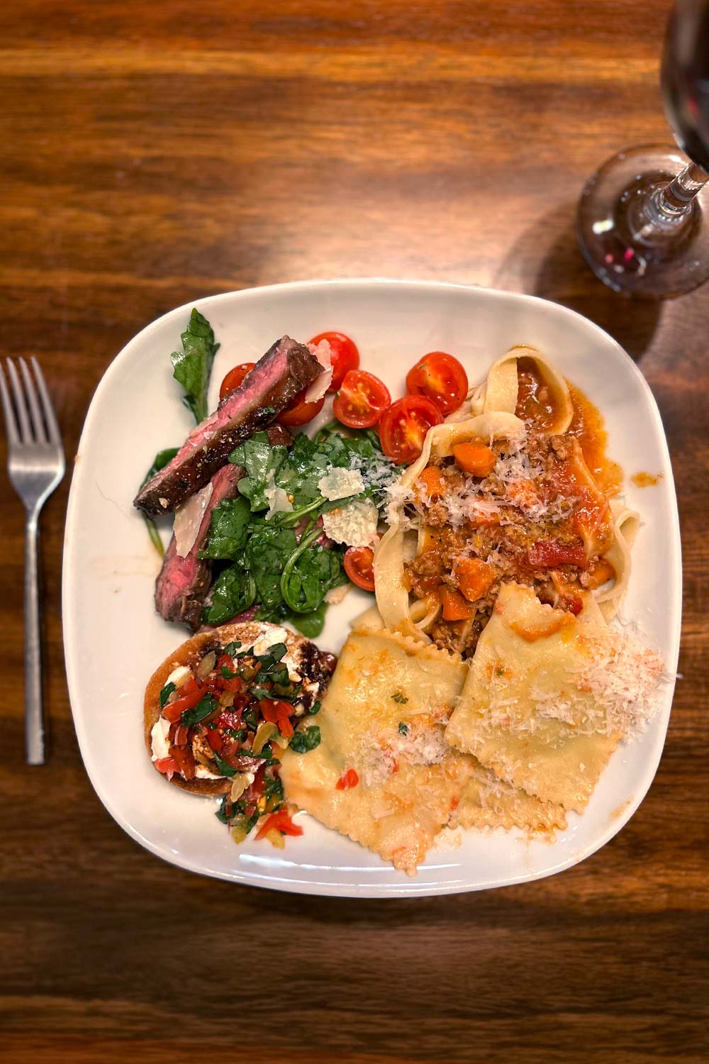 An example of a plate of food for an italian theme night at a monthly supper club meeting with a group of friends