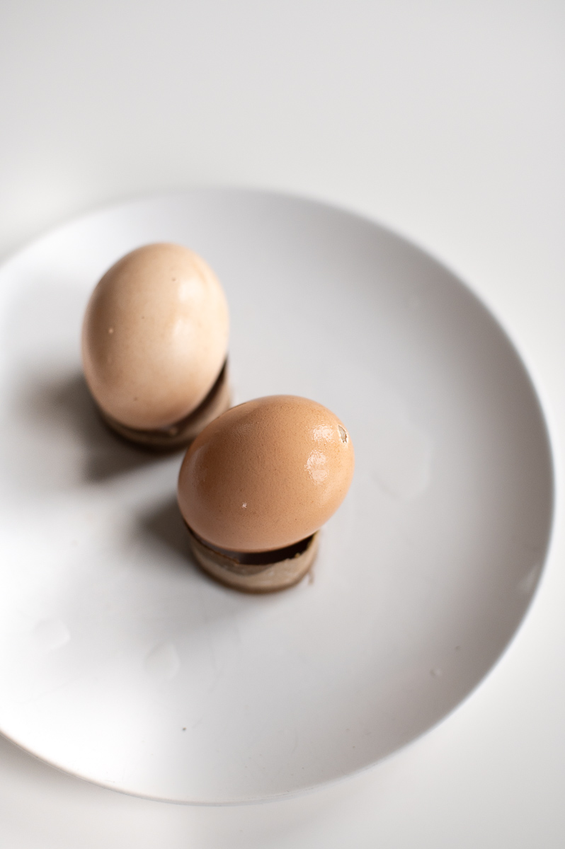 Eggs lightened with cold vinegar soak for pastel Easter dye