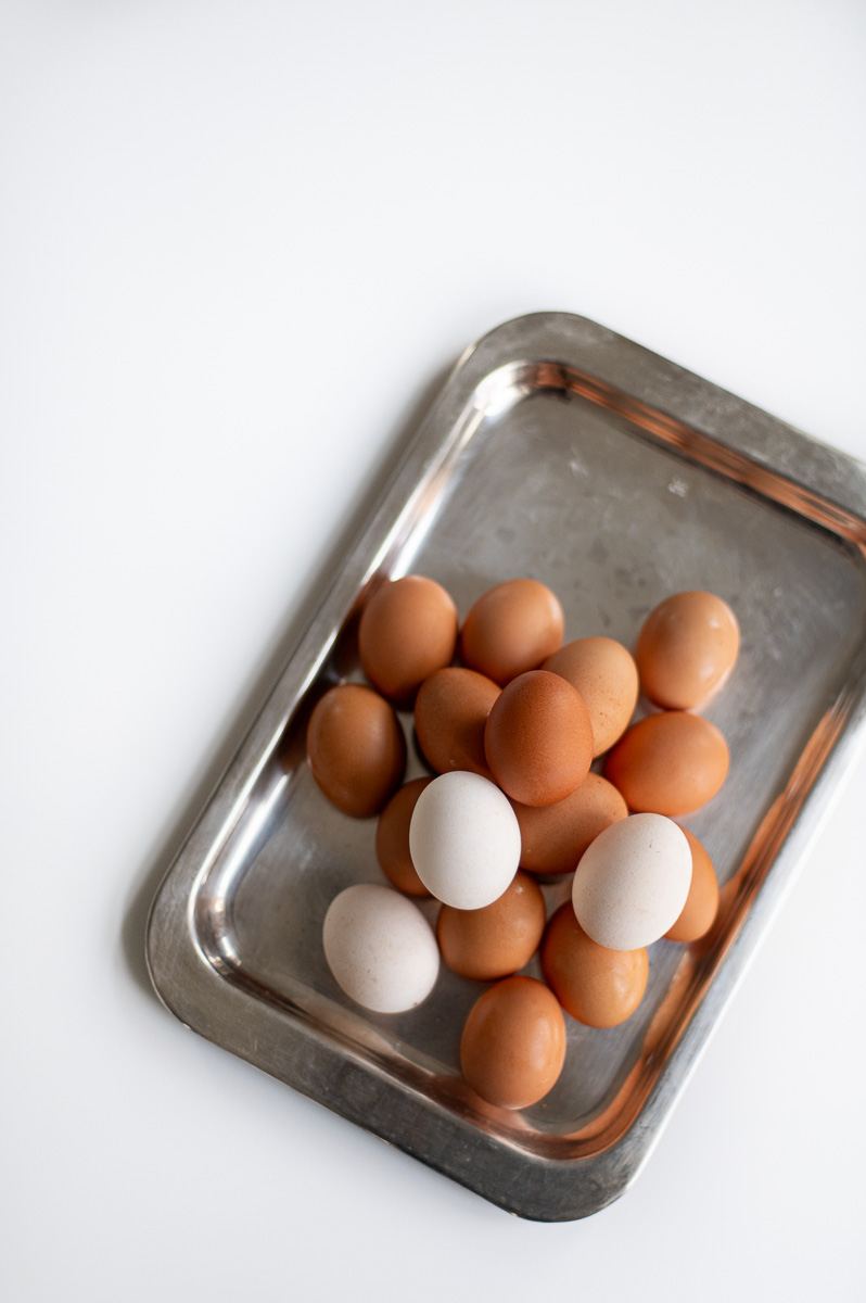 Brown eggs transformed into lighter shells for pastel Easter dye