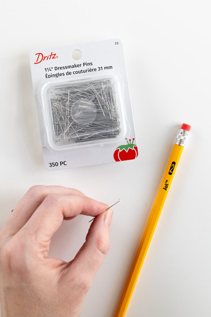 how to make a simple tool to that will allow you to create pysanky without a kistka using dressmakers pin and pencil.